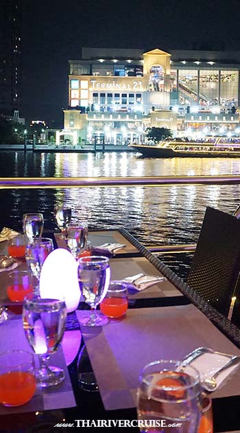 Chaophraya Princess Cruise Indian Food -Authentic Indian Buffet: This isn't a token few dishes. It’s a dedicated, extensive menu featuring both vegetarian and non-vegetarian Indian delicacies, from savory appetizers to rich curries and fresh naan. Indian Dinner Cruise Bangkok Booking Chao Phraya Princess Chao Phraya Princess Indian Dinner Cruise Bangkok with Indian Food Buffet Thailand- Indian buffet menu as; APPETIZER IMITATION CRAB MEAT SALAD ALOO CHAAT PAPAD SALAD BAR SALAD BAR 6 DIFFERENT SOUP SPICY SHRIMP SOUP TOMATO SOUP HOT DISH CHICKEN MASALA FISH FINGER WITH TARTAR SAUCE CHICKEN TIKKA BAKED SHRIMP WITH SALT FISH CURRY FRIED MIXED PAKORA FRENCH FRIED POTATO SPAGHETTI TOMATO SAUCE SAUSAGE RED SAUCE CHICKEN BIRYANI STEAMED RICE NAAN BREAD-BUTTER DESSERT MIXED FRUIT IN SEASON PASTRY HOT TEA & COFFEE VEGETARIAN INDIAN PANEER MASALA DAL TARKA GOBI MATTER SAMOSA RAITA YELLOW RICE