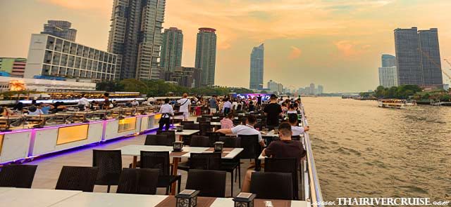 The Luxury White Twilight Cruise Romantic Sunset Bangkok - Golden Hour Perfection: Catch the transition from day to night as the temples begin to glow. Three-Deck Luxury: Choose between the breezy open-air rooftop or the cozy, air-conditioned lower decks.
