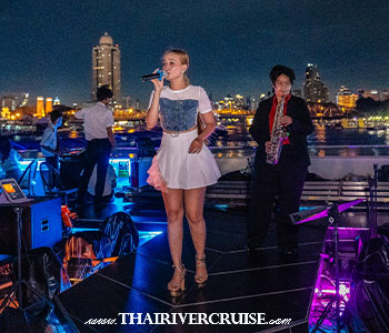 Fine Dining Bangkok Valentine Day The Planet Cruise - Entertainment: Enjoy a live duo band playing romantic hits, followed by a mesmerizing Thai Classical Khon dance performance.
