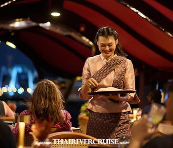 Aboard a restored antique teak rice barge, you aren't just a tourist; you are a guest in a floating sanctuary of fine Thai cuisine and heritage luxury. - Luxury Ricebarge Valentine Day Dinner Manohra Cruises romance dinning 5 Star Chaophraya River boat Aboard a restored antique teak rice barge, you aren't just a tourist; you are a guest in a floating sanctuary of fine Thai cuisine and heritage luxury. - Luxury Ricebarge Valentine Day Dinner Manohra Cruises romance dinning 5 Star Chaophraya River boat