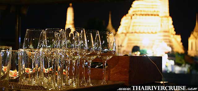 Constantly Changing Views of the City A Chao Phraya river party boat acts as a moving viewing deck. Your guests can sip drinks while drifting past beautifully lit iconic landmarks, including: The grand structures of Wat Arun (The Temple of Dawn) The historic architecture of the Grand Palace The bustling, modern lights of Icon Siam - Small group thank you party on a Bangkok private party boat Constantly Changing Views of the City A Chao Phraya river party boat acts as a moving viewing deck. Your guests can sip drinks while drifting past beautifully lit iconic landmarks, including: The grand structures of Wat Arun (The Temple of Dawn) The historic architecture of the Grand Palace The bustling, modern lights of Icon Siam - Small group thank you party on a Bangkok private party boat
