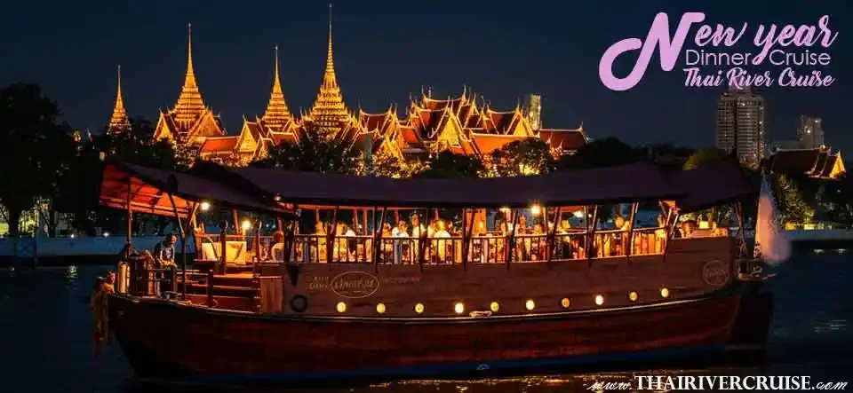 Manohra Cruise antique rice barge sailing the Chao Phraya River for New Year's Eve Manohra Cruise antique rice barge sailing the Chao Phraya River for New Year's Eve