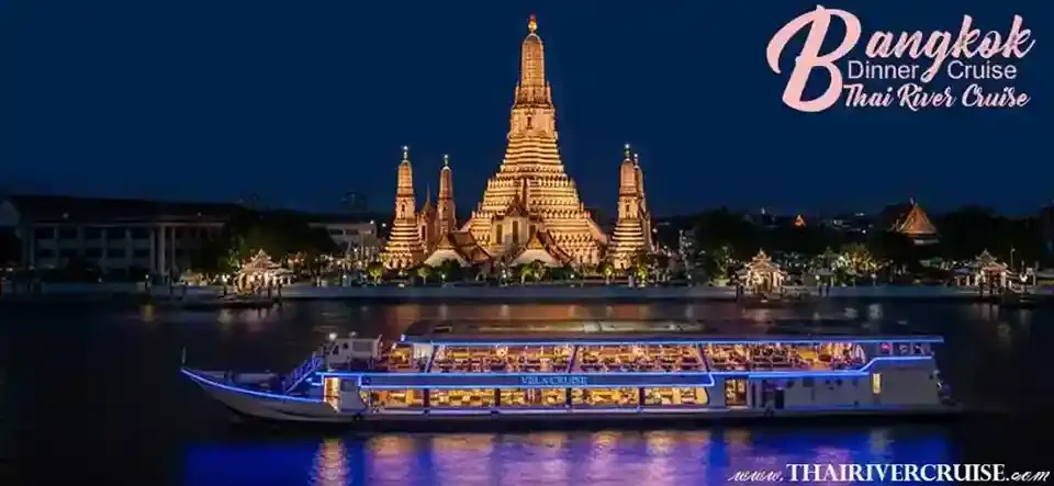 Vela Cruise guests enjoying Thai cuisine while passing illuminated landmarks on the Chao Phraya River Vela Cruise guests enjoying Thai cuisine while passing illuminated landmarks on the Chao Phraya River